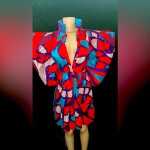 This is a beautiful color combination midi dress. Never worn .  Light weight